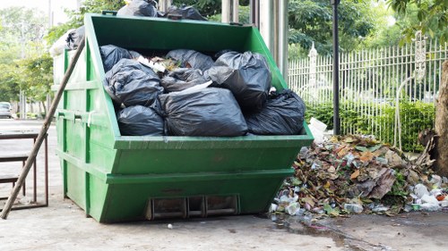 Customer using skip hire service in Peckham